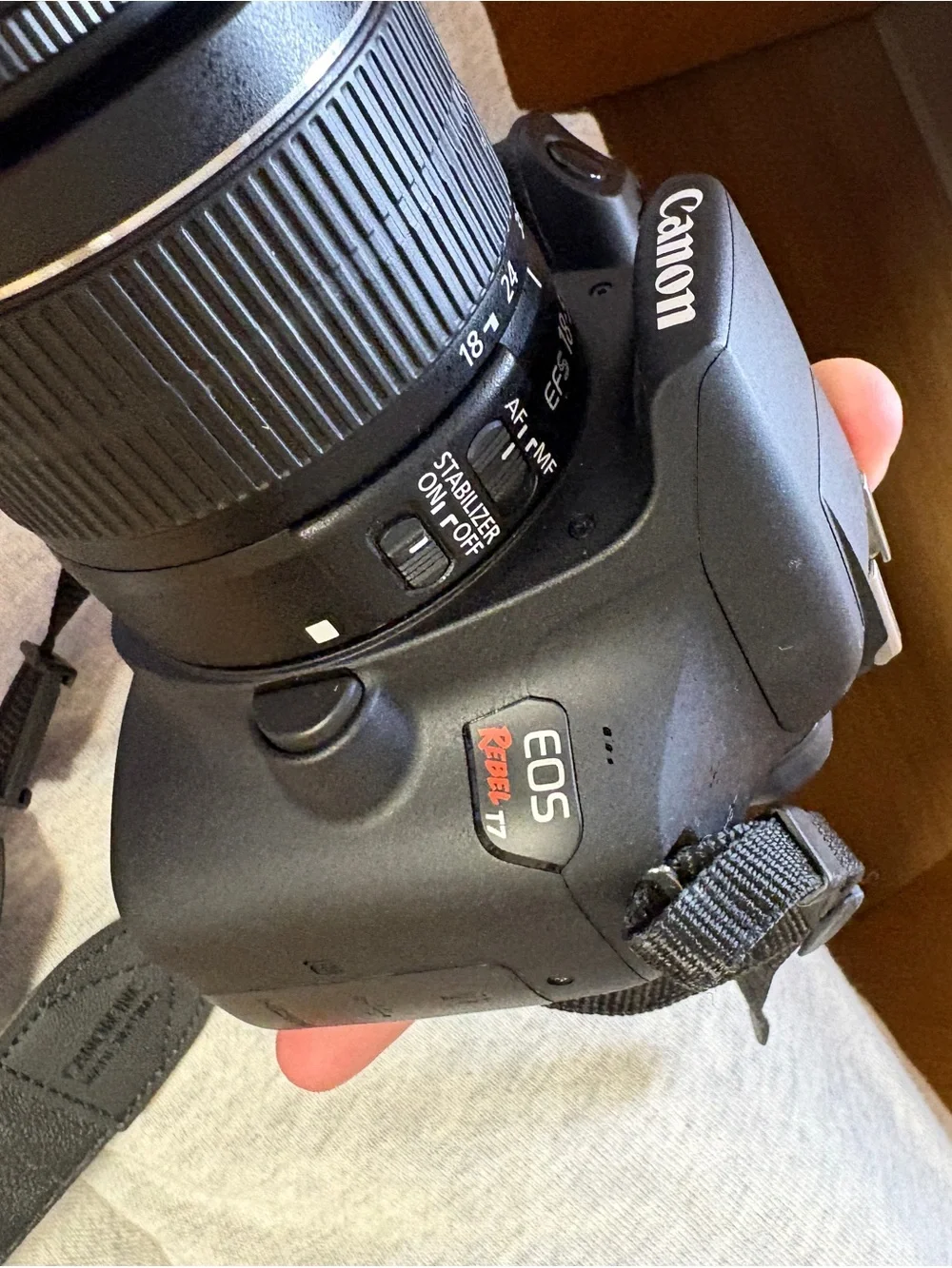 Canon DSLR Camera with Black Body and Black 18-55mm Lens